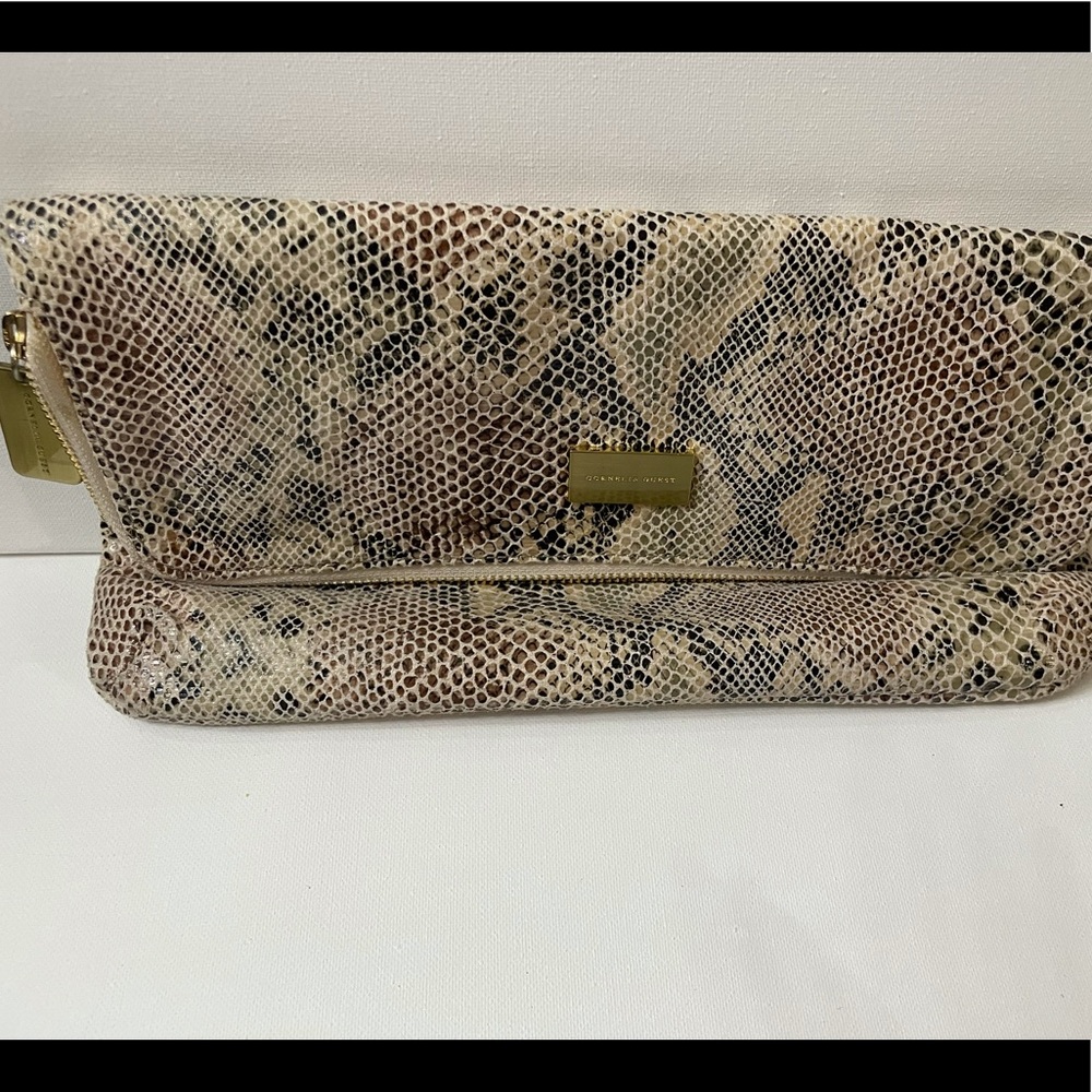 Snake print Clutch. Never used.